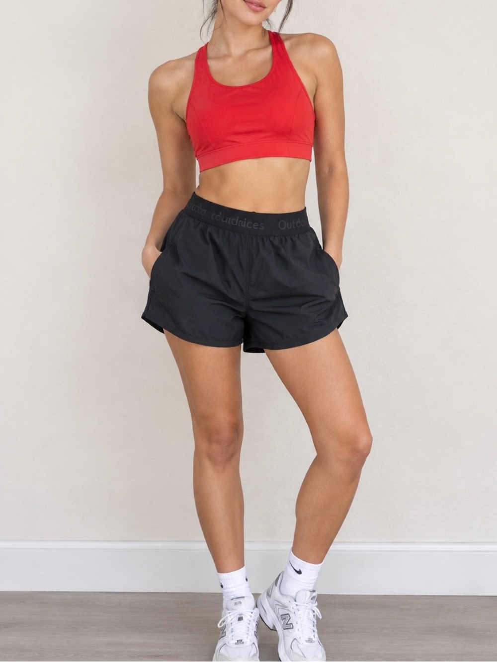 Outdoor Voices Black Athletic Shorts and red sport bra- Women's Running Shorts